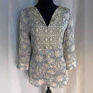 The limited dressy top